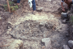 Lilian Funnell drawing furnace 2 during excavation: photo F. Tebbutt