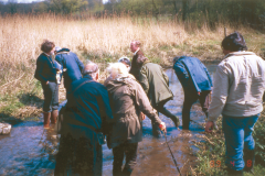 Looking in a stream for slag ... somewhere in France