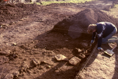 Roffey, excavating the footprint of the ?smithing building: photo J. Hodgkinson