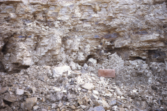 Quarry face with beds of iron ore nodules: photo F. Tebbutt