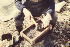 Roger Adams breaking the copper ore: photo anon